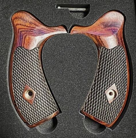 Open Backstrap, finger grooves, palm swells and is relieved for speedloaders. . Taurus 605 grips ebay
